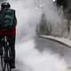 A delivery worker cycles through Manhattan on December 02, 2020.